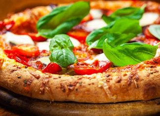 Pizza Margarita con muzzarella, albahaca y 200 calorías por porción