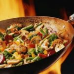 Wok de vegetales, champiñones y almendras